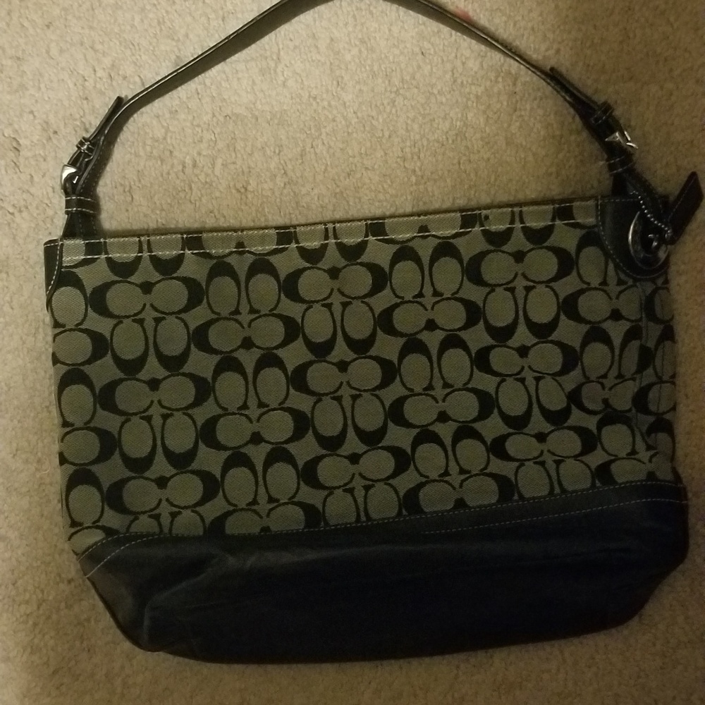 Medium sized designer purse brand new without tags